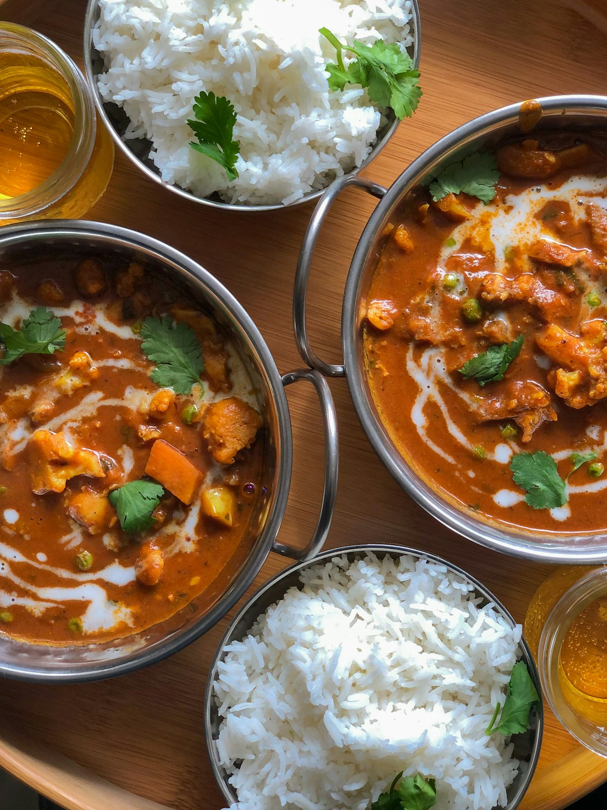 Sri Lanka Food Guide: Dishes You Must Try 2 Chicken curry served with rice and fresh salad on a plate